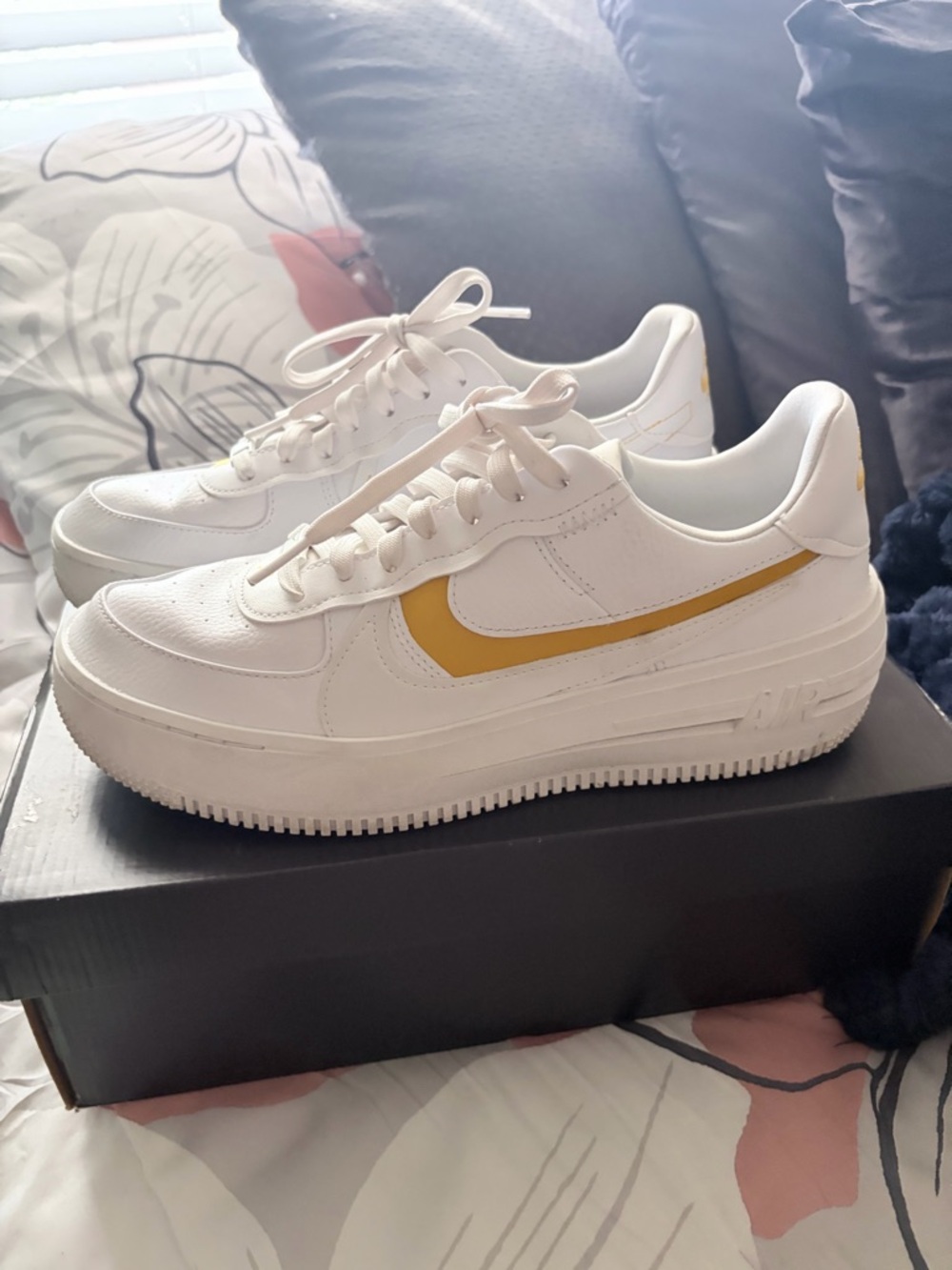 Nike Women’s Air Force Black 1 Sneakers with Gold Swoosh, Platform